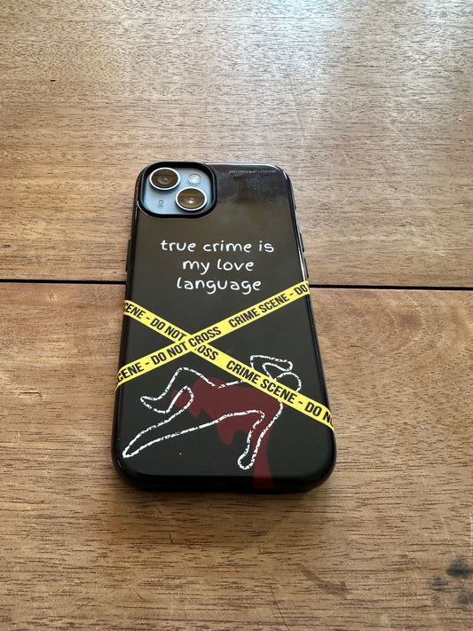 a tough iphone case with "true crime is my love language" written on it