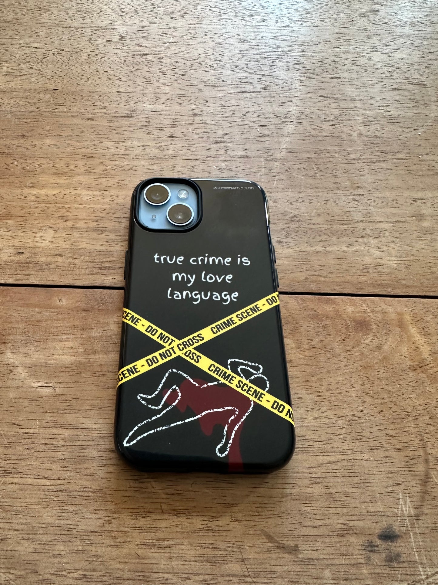 "True Crime is My Love Language" Tough iPhone Case.