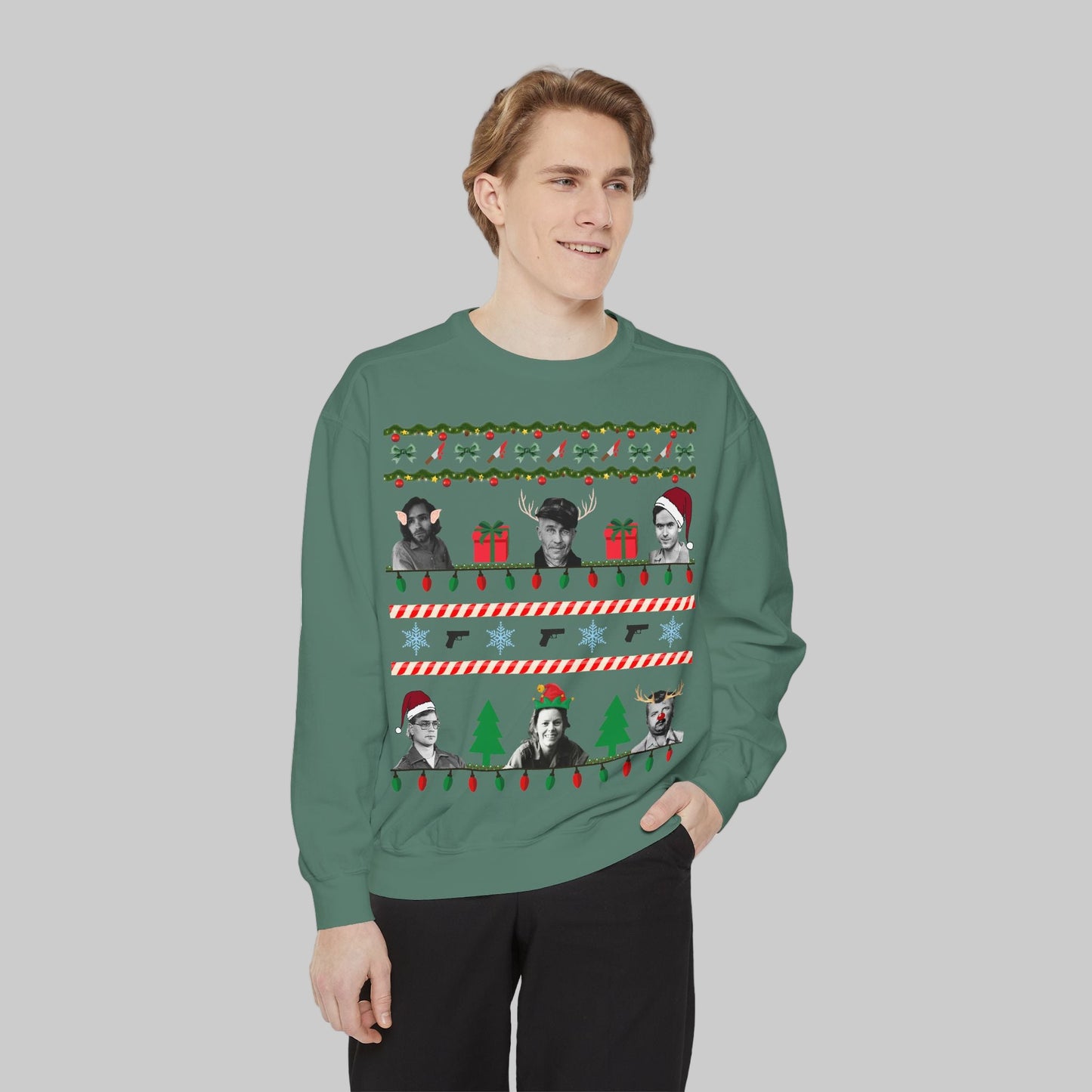 Person wearing a green sweater with Christmas-themed designs on a white background