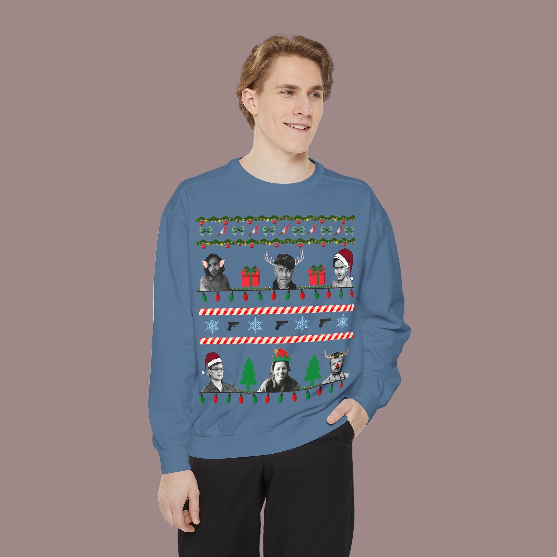 Person wearing a blue sweater with Christmas-themed designs on a white background