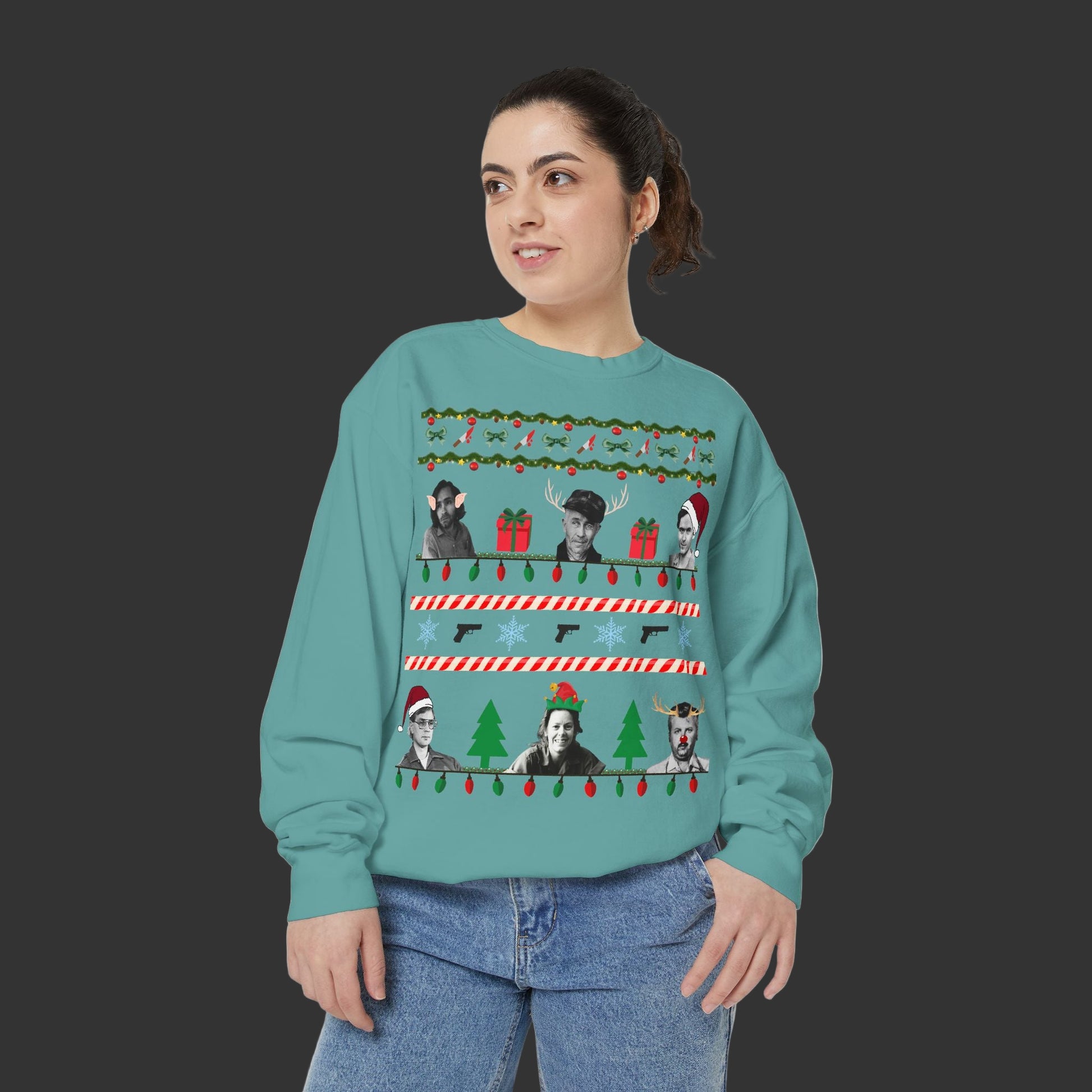 Person wearing a teal sweater with a festive design on a white background