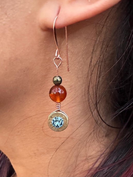 Bullet casing jewelry with a swarovskit crystal
